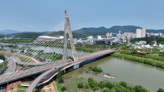 Modern city with bridge and river