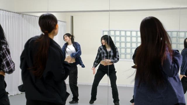 K-POP Dancers Practicing in a Studio