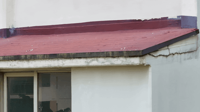 Exterior wall with visible cracks