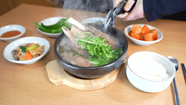 Hot galbitang served with side dishes