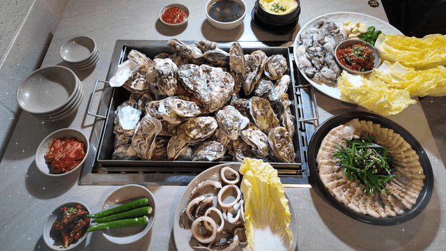 Table set with steamed oysters