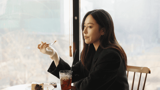 Woman enjoying dessert and iced tea