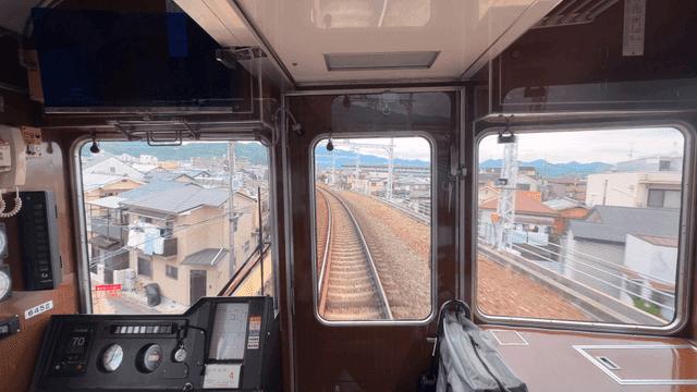 View from inside driver's cab of moving train