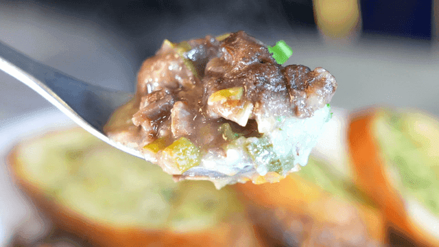Spoonful of hearty beef stew