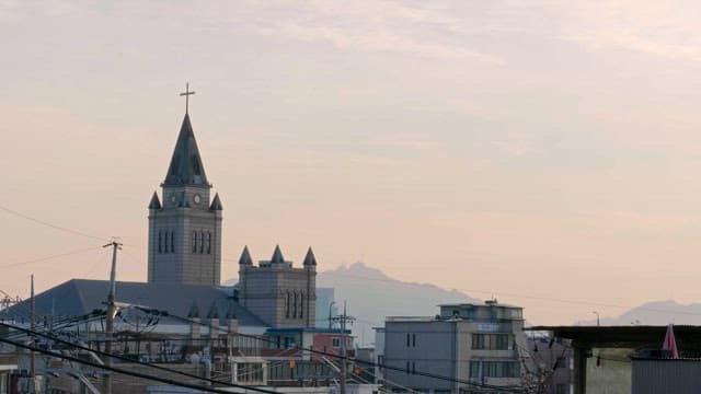 Dusk illuminating the church and buildings