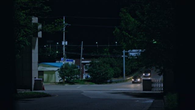 Quiet Streets at Night with Cars Passing