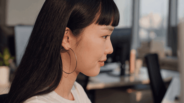 Woman working at desk in office