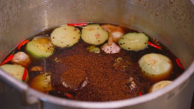 Boiling ingredients in a pot to make broth