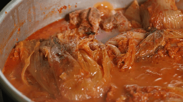 Kimchi stew boiling in a pot