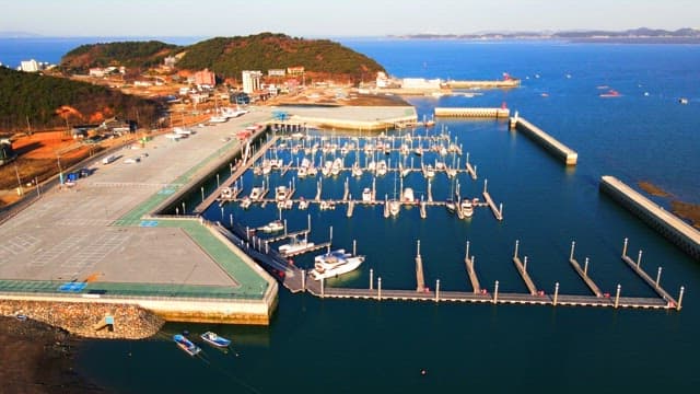 Quiet yacht marina in a coastal town on a sunny day