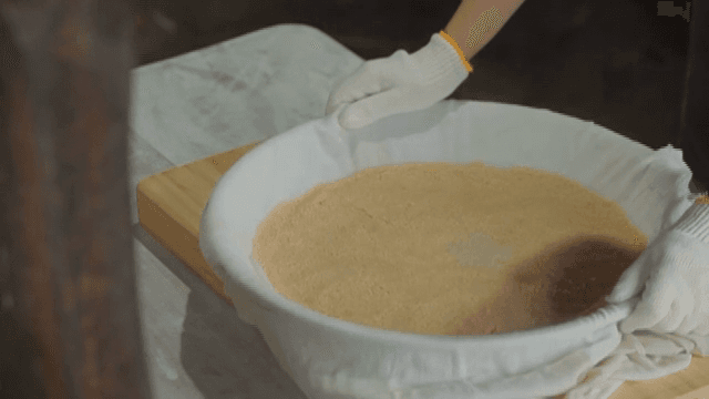 Preparing traditional Korean rice cake