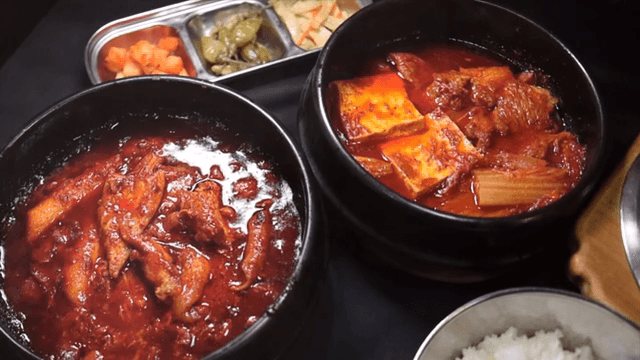 A table of Korea dishes and some cash