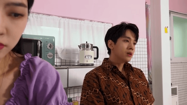 Man talking to woman with angry face