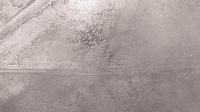 Aerial view of vast mudflat landscape