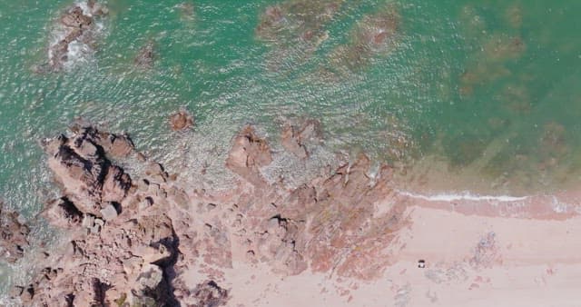 Serene beach with rocky formations