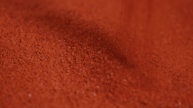 Sight of red chili powder pouring out