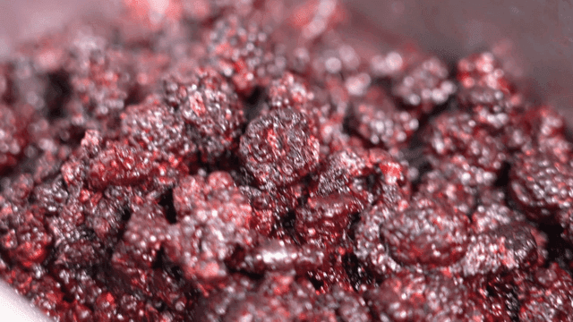 Tray containing fresh black raspberries