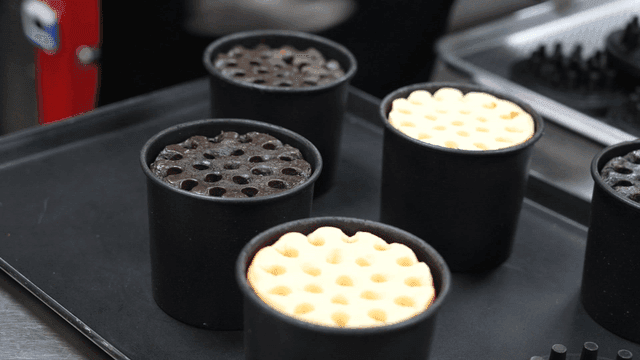 Process of baking dough in briquette-shaped mold