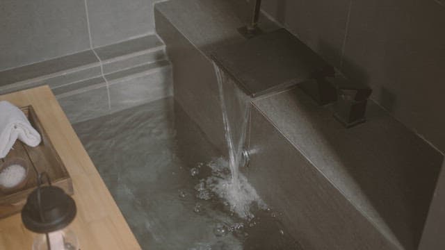 Modern Bathtub Filling with Running Water