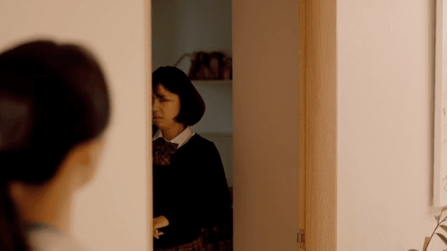 Daughter who enters room roughly and mother who knocks on door