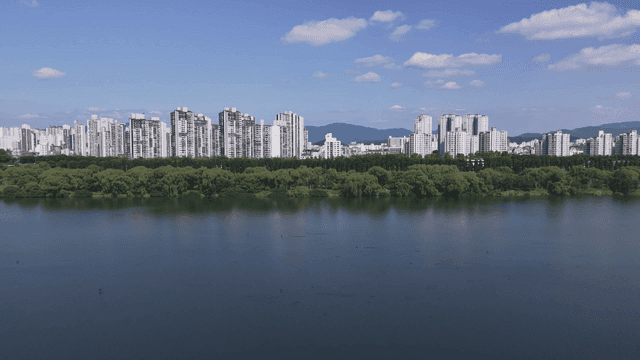 City skyline with rivers and trees