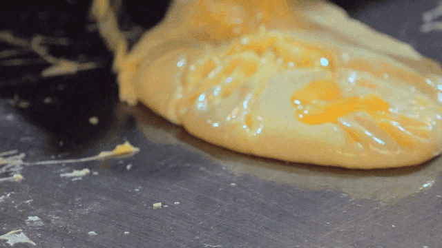 Hot griddle cooking egg omelet