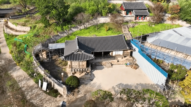 Traditional Korean house in a serene landscape