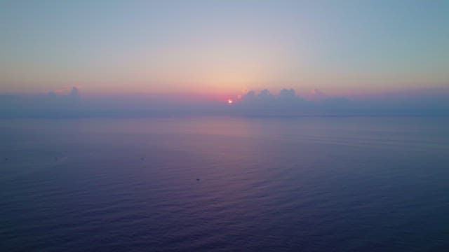 Sunset over a calm ocean