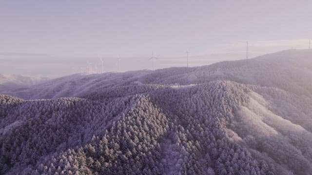 Snow-Covered Mountain Landscape at Dawn