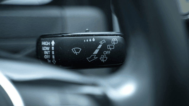 Close-up of a car's wiper control lever