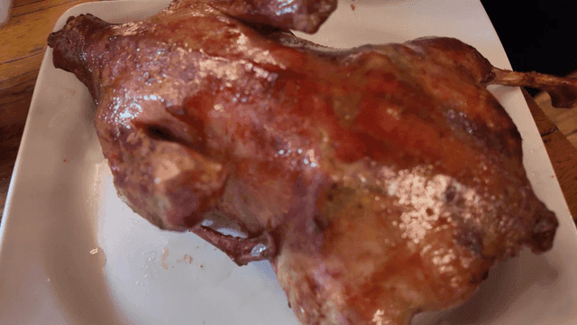 Smoked duck served on plate