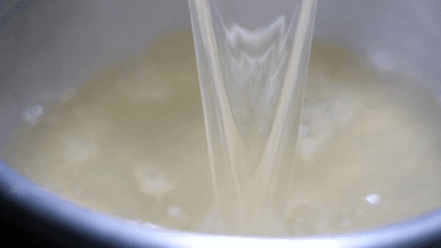 Broth poured into pot