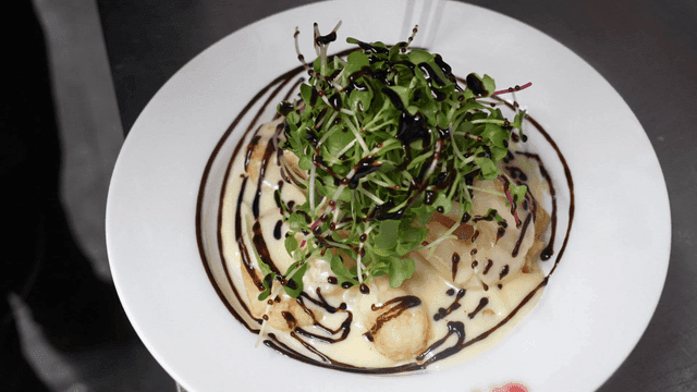 Creamy shrimp with balsamic sauce poured over it