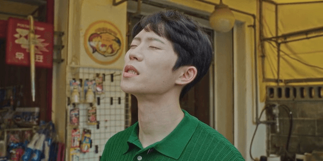 A man speaking with a sigh