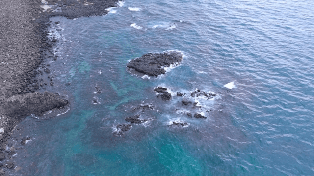 Rocky coastline with clear blue water