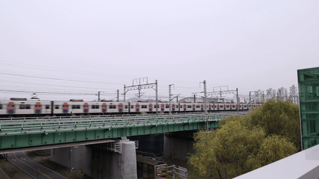 Subway passing under bridge