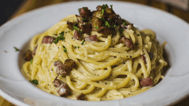 Plate of creamy carbonara pasta