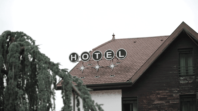 Old-fashioned building with hotel sign