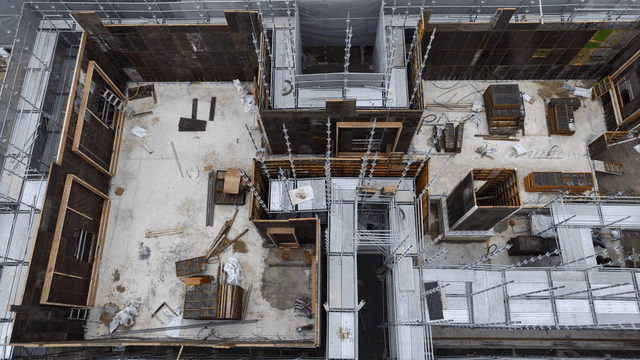 Construction site with scaffolding and materials