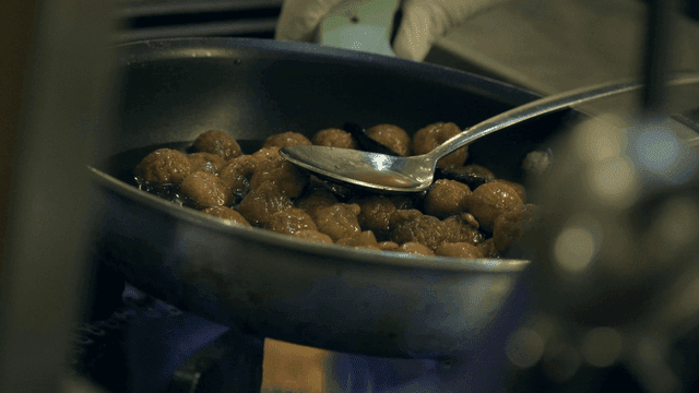 Chestnuts simmered in pan with syrup