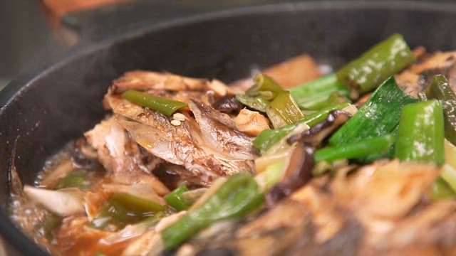 Appetizing braised fish with fresh vegetables