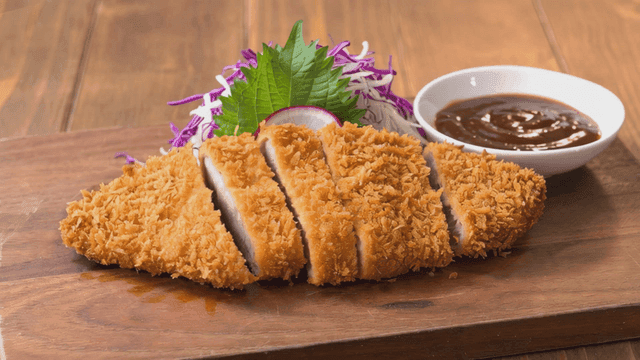 Crispy tonkatsu with sauce and garnish