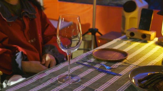 Sparkling wine prepared in a wine glass on a cozy table