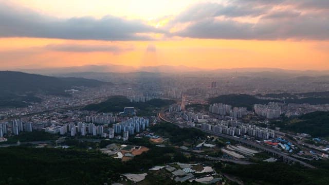 Sprawling cityscape at sunset