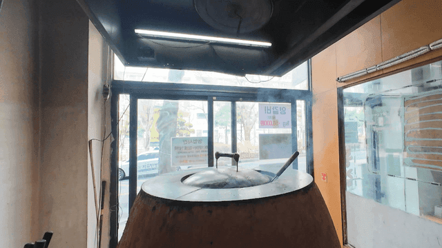 Large pot steaming in kitchen