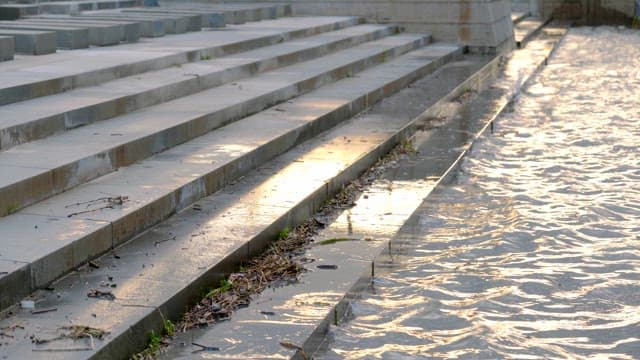 River flowing over concrete steps