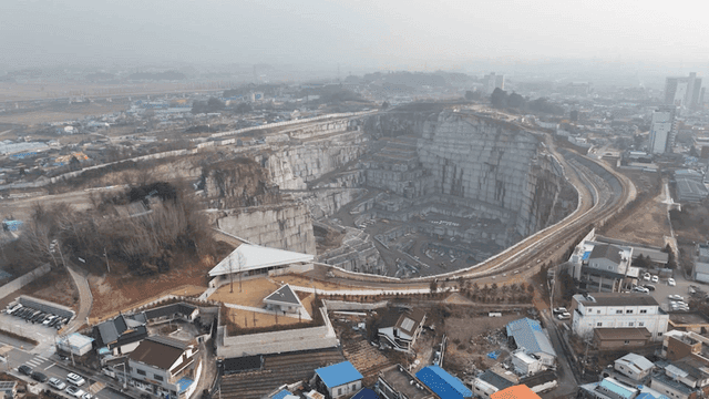 Aerial view of large deep quarry