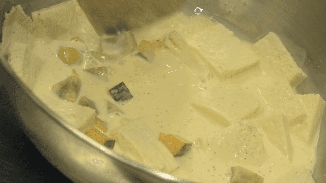 Mixing ingredients in a creamy sauce