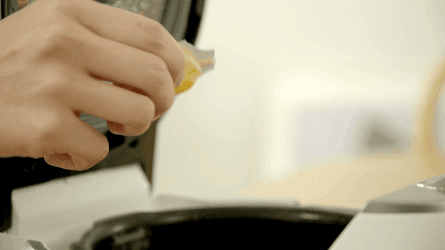 Liquid turmeric poured into rice cooker