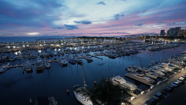 Twilight Marina with Boats and Skyline